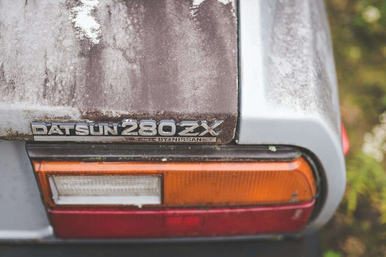 Classic Datsun 240Z parked in a garage