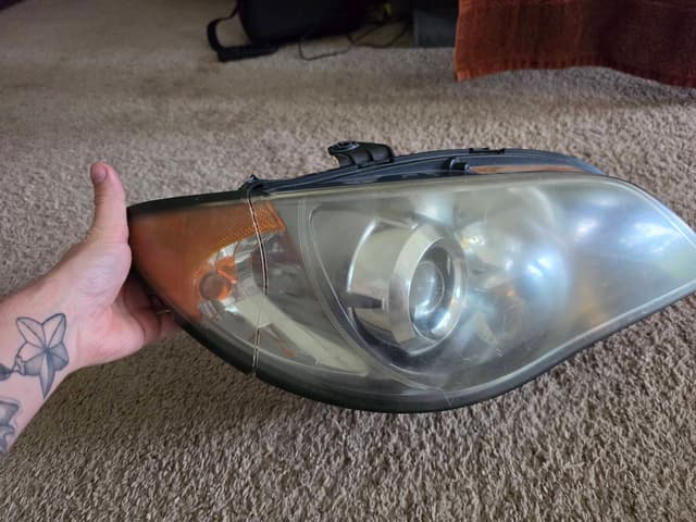 Photo from build update: Resealed the headlights. Saved a bunch of money (OEM replacements is like 600 dollars. 💀)