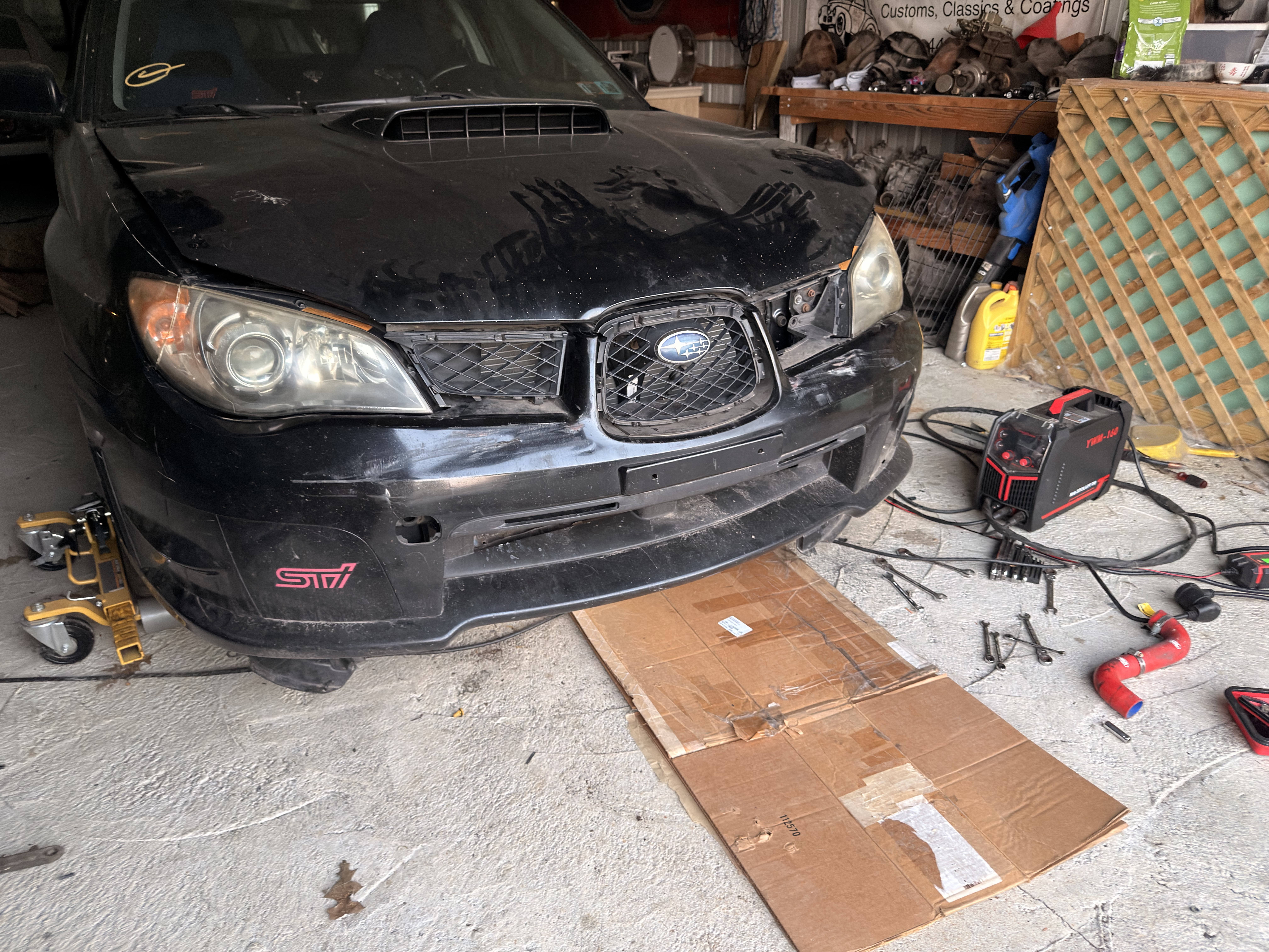 Headlights and bumper roughed in. Mostly checking panel gaps from the rad support being welded in.